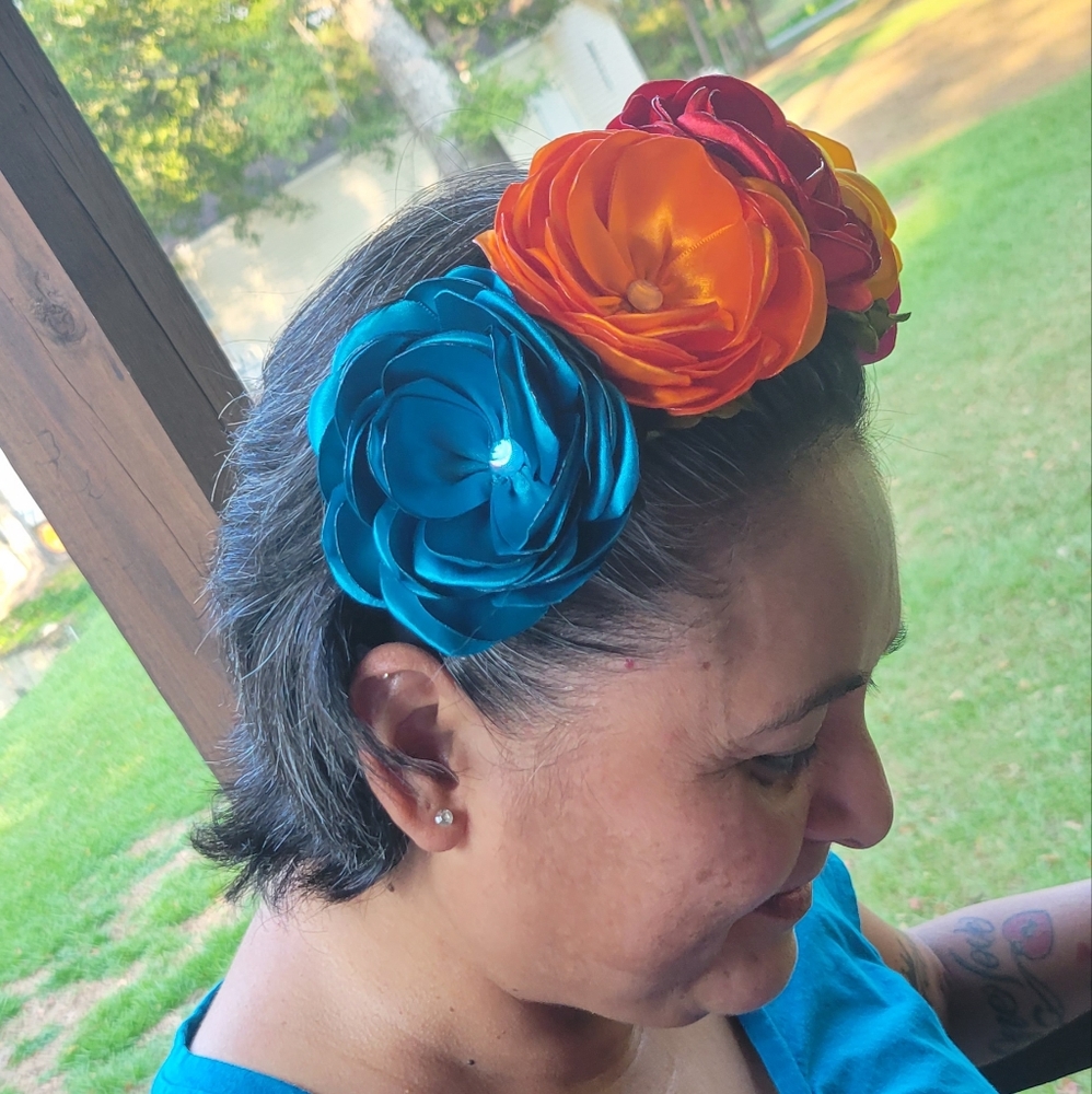 Handcrafted satin flower headband.